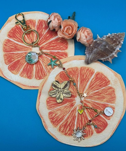 Grigri de sac en perles doré